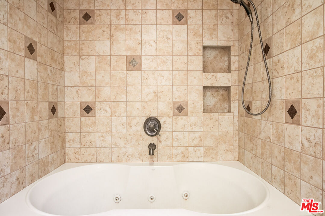 23620 Sunset Crossing Road Diamond Bar, CA 91765 - Photo 28 of 41 a bathroom with a bathtub
