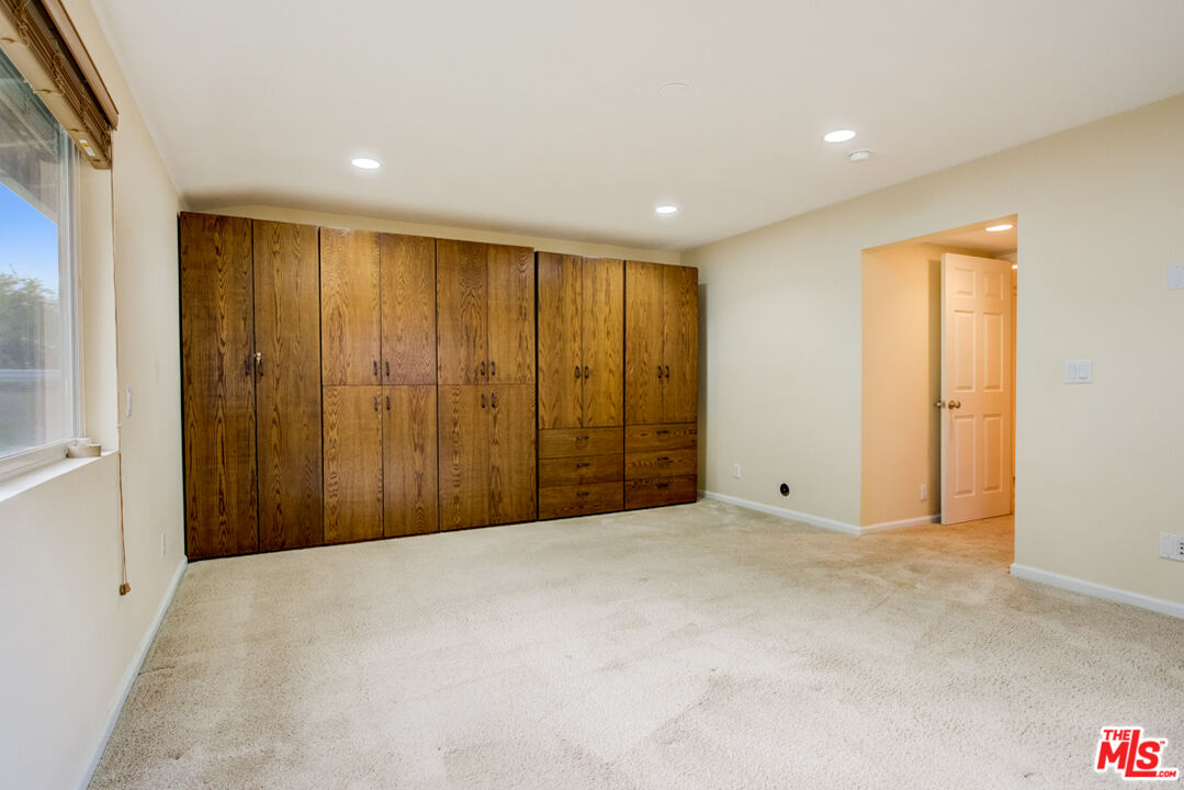 23620 Sunset Crossing Road Diamond Bar, CA 91765 - Photo 31 of 41 a view of an empty room with a window