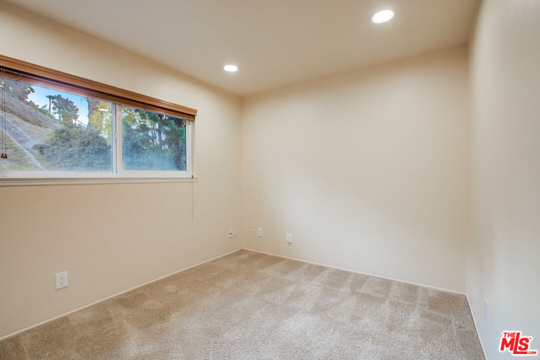 23620 Sunset Crossing Road Diamond Bar, CA 91765 - Photo 35 of 41 an empty room with a window