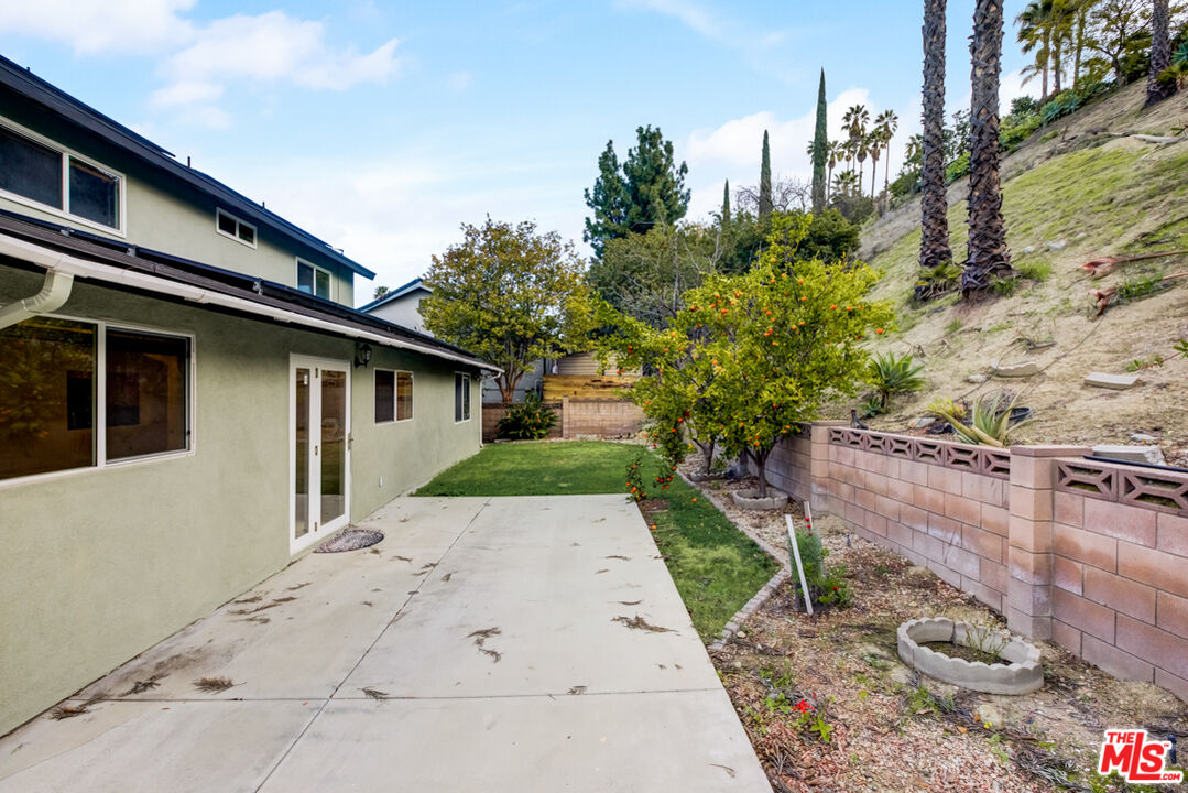 23620 Sunset Crossing Road Diamond Bar, CA 91765 - Photo 39 of 41 a backyard of a house with plants and trees