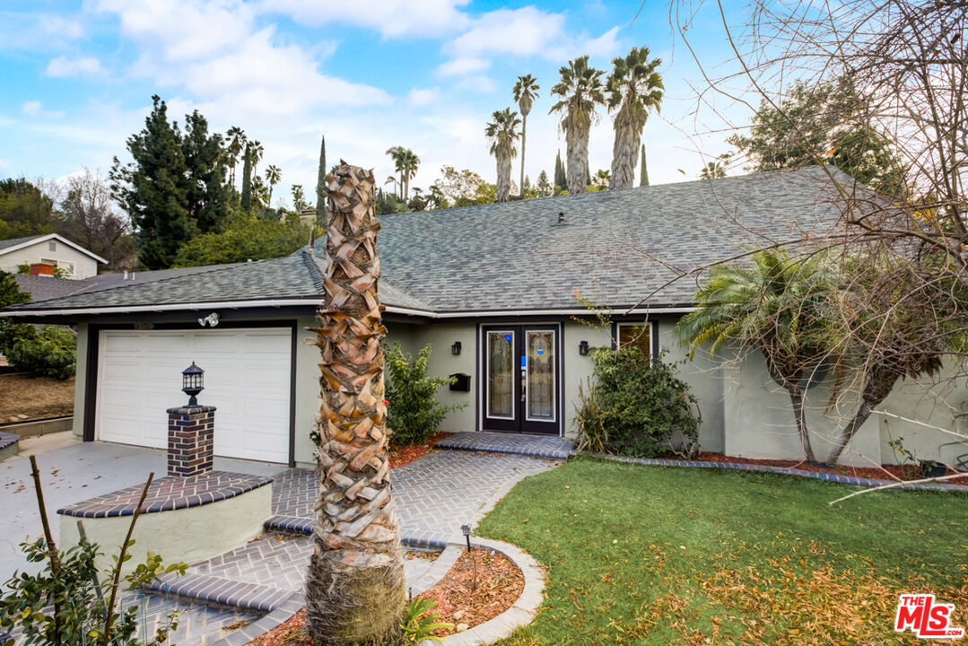 23620 Sunset Crossing Road Diamond Bar, CA 91765 - Photo 10 of 41 a front view of a house with garden