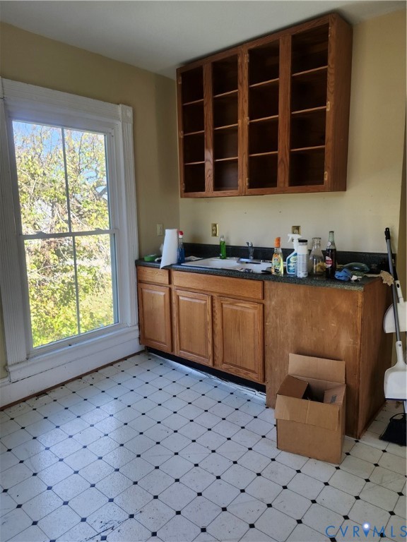 25 Fitzgerald Road Cumberland, VA 23040 - Photo 13 of 19 Kitchen featuring light flooring and brown cabinet