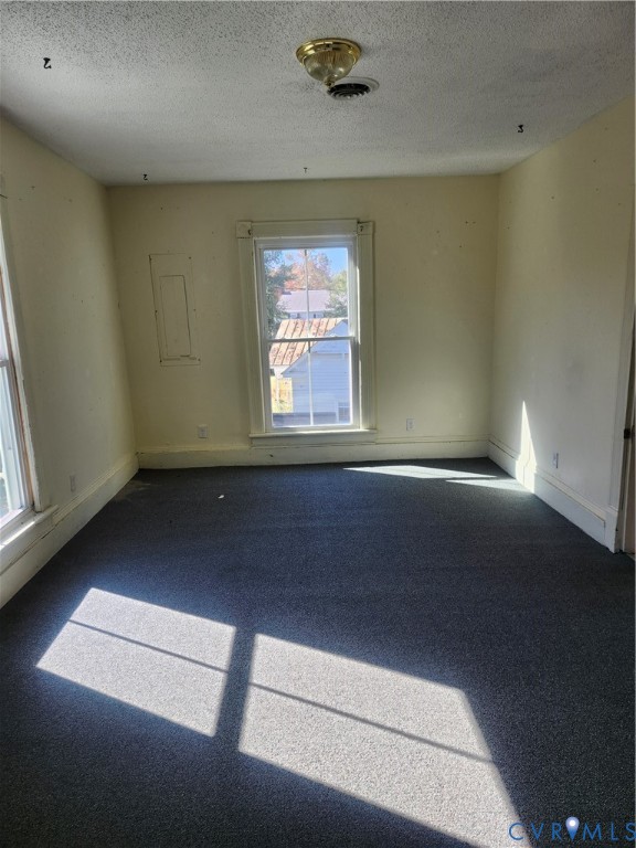 25 Fitzgerald Road Cumberland, VA 23040 - Photo 14 of 19 Spare room with a textured ceiling and electric pa