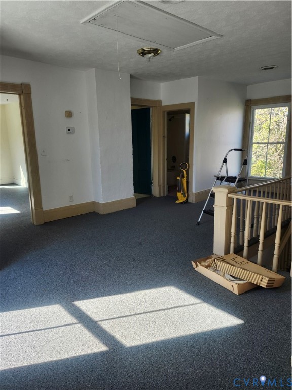 25 Fitzgerald Road Cumberland, VA 23040 - Photo 15 of 19 Empty room with attic access, a textured ceiling,