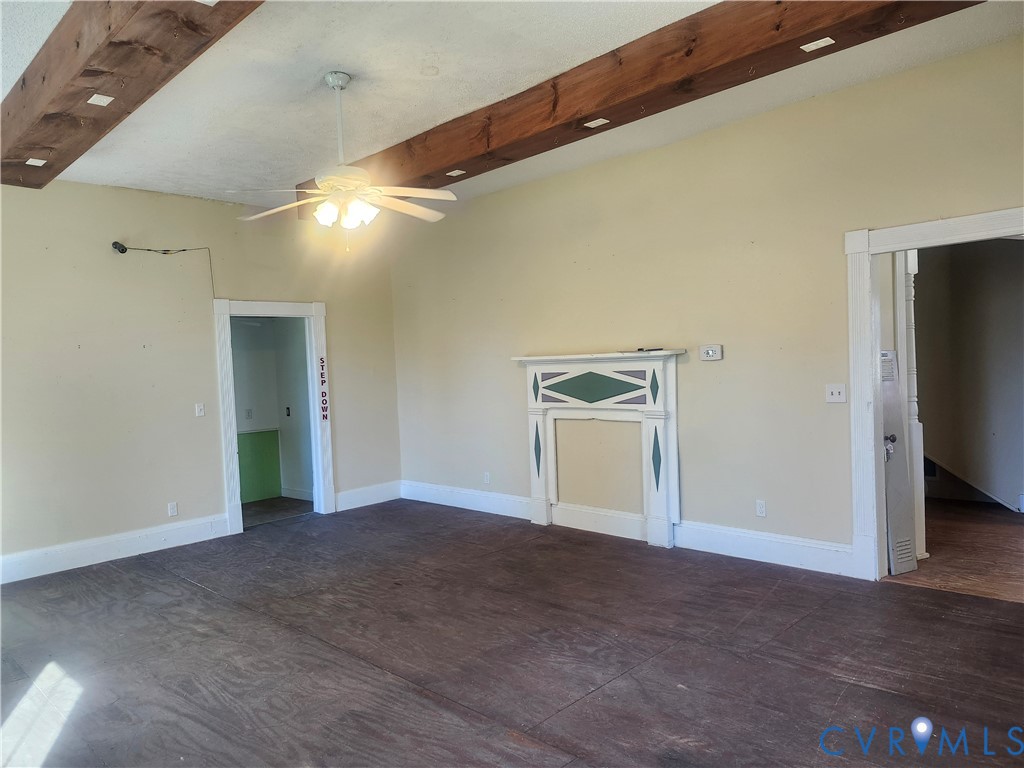 25 Fitzgerald Road Cumberland, VA 23040 - Photo 5 of 19 Spare room with beamed ceiling, dark wood-style fl