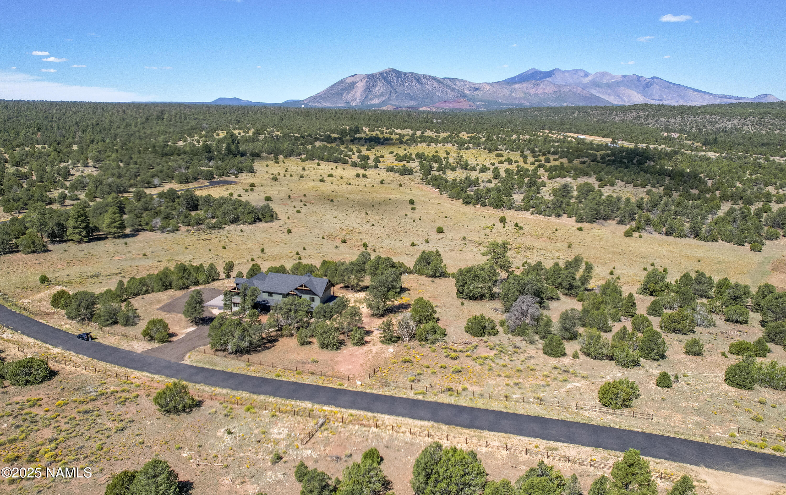 8488 Tall Tales Rnch Road Flagstaff, AZ 86004 - Photo 2 of 52 a view of a mountain with a lake view