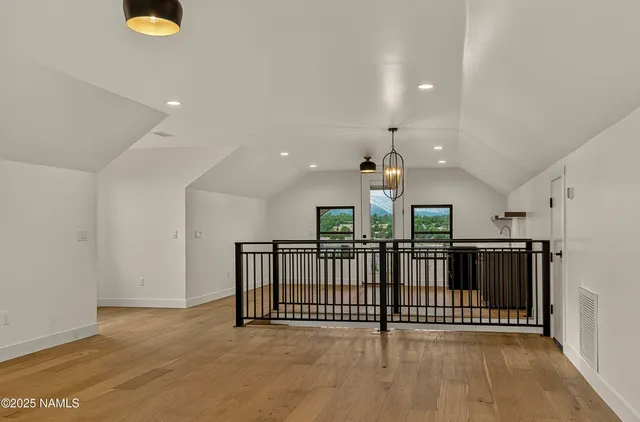 a bathroom with a toilet sink and shower