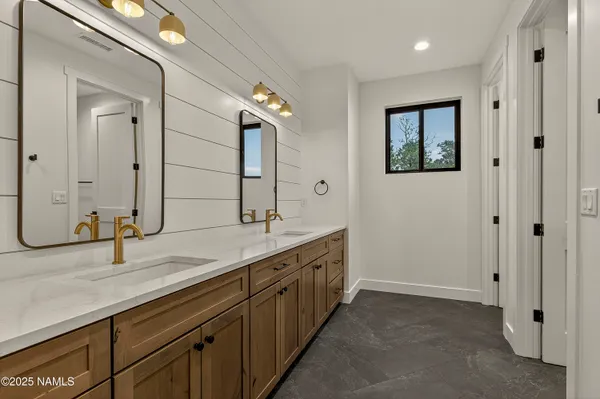 a bathroom with a shower and a shower