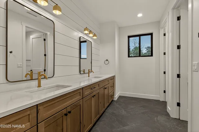 a bathroom with a shower and a shower