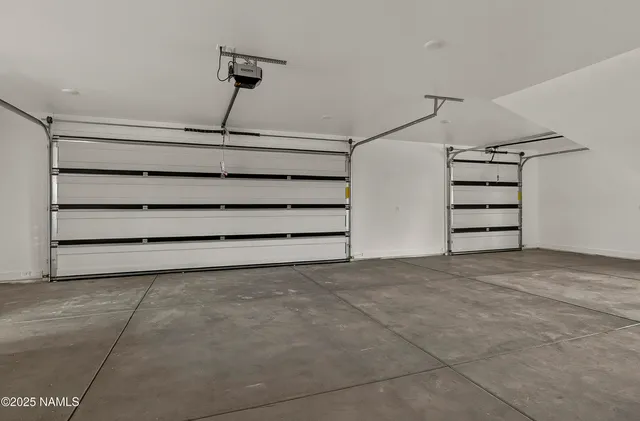 a view of a ocean with a floor to ceiling window