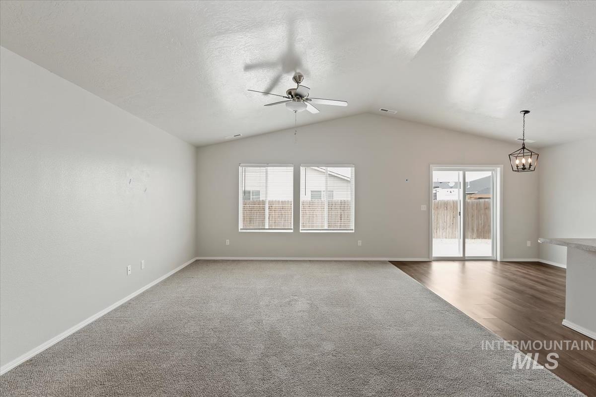1685 Southwest Levant Way Mountain Home, ID 83647 - Photo 13 of 31 Unfurnished room featuring healthy amount of natural light and ceiling fan