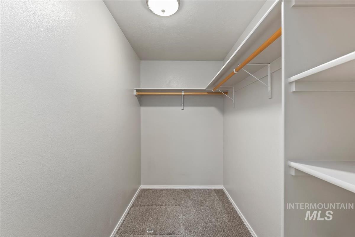 1685 Southwest Levant Way Mountain Home, ID 83647 - Photo 25 of 31 Walk in closet with carpet floors