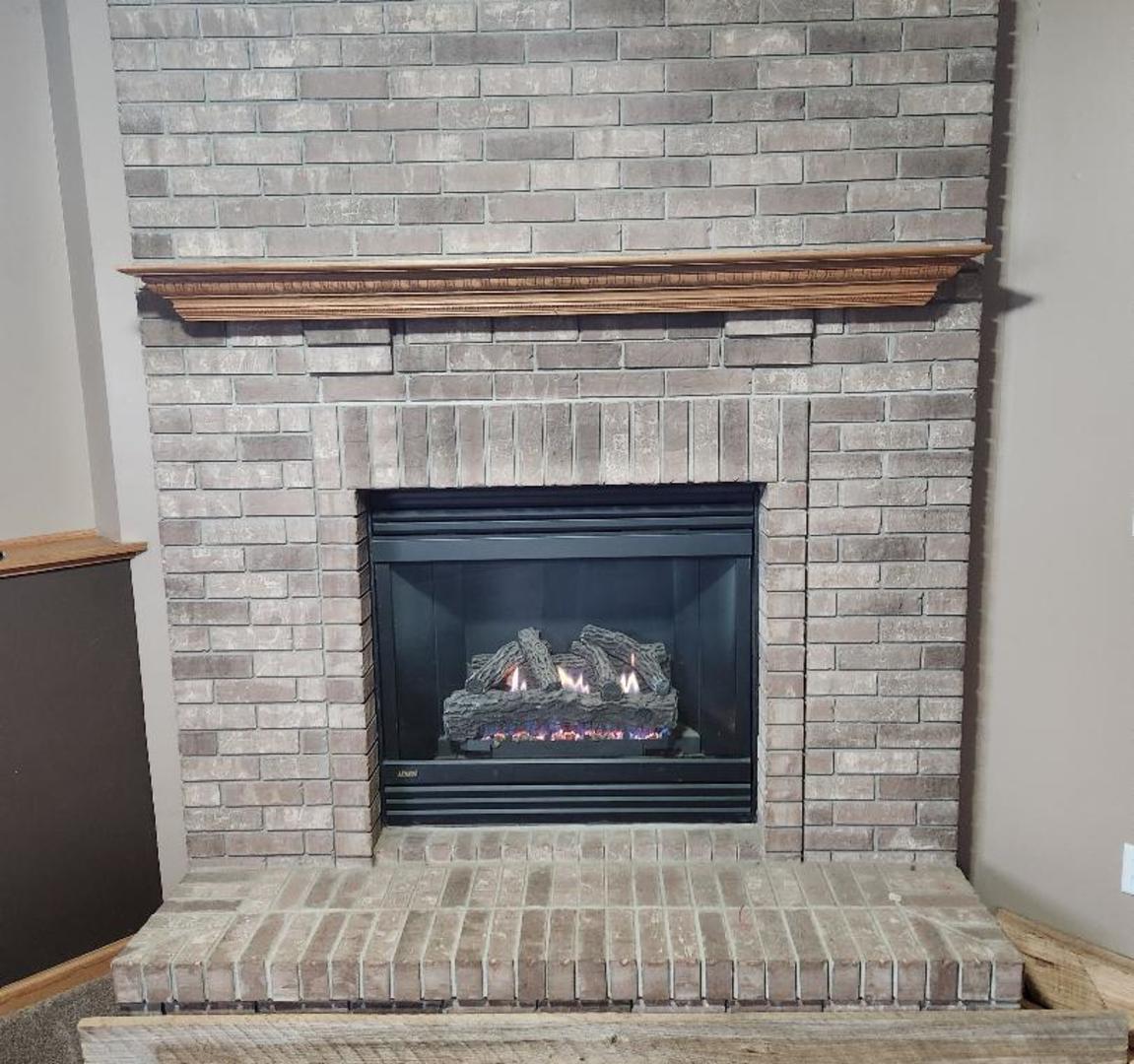 602 Sandra Street Kingston, IL 60145 - Photo 12 of 18 a fireplace with a fireplace