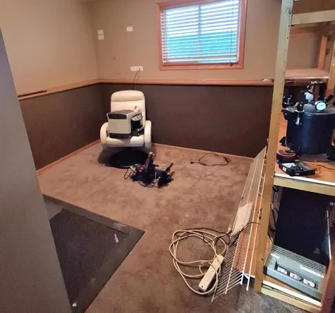 a view of a patio with table and chairs potted plants