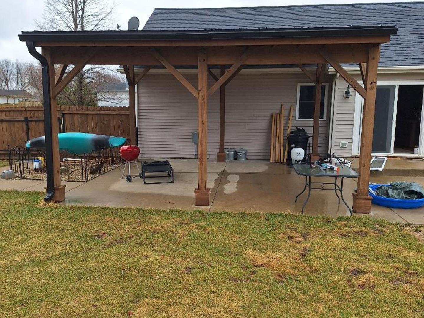 602 Sandra Street Kingston, IL 60145 - Photo 8 of 9 a view of a house with backyard and porch