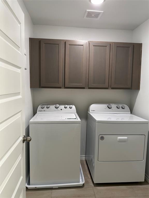 3004 Baneberry Lane, Unit 43 Mesquite, TX 75150 - Photo 9 of 16 a utility room with dryer and washer
