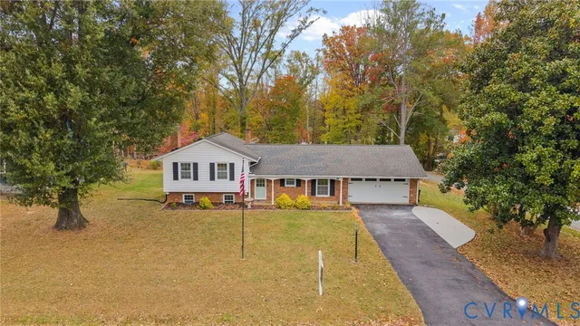 a house with trees in the background