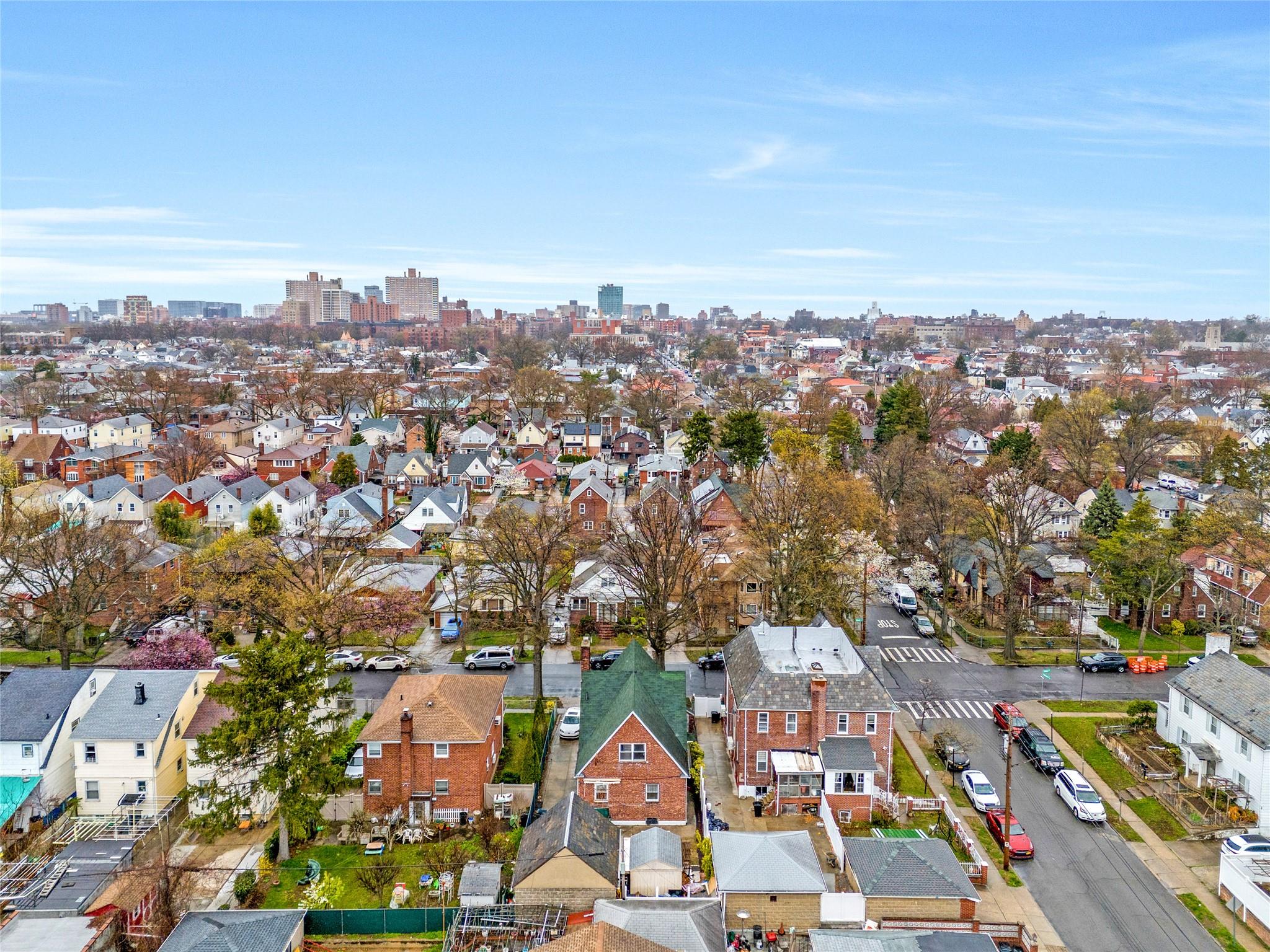 140-50 Quince Avenue Queens, NY 11355 - Photo 8 of 13 an aerial view of residential building with green space