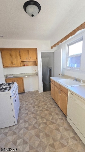 362 Columbia Boulevard Wood-Ridge, NJ 07075 - Photo 13 of 13 a kitchen with a cabinets and appliances