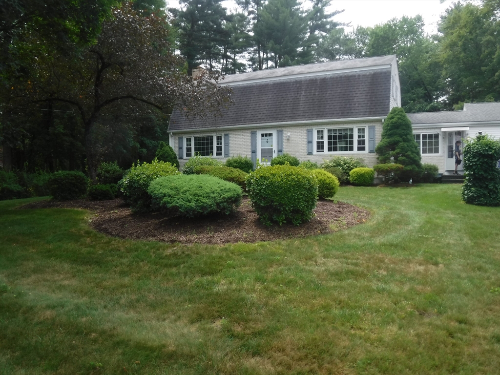 21 Old Orchard Road Hampden, MA 01036 - Photo 2 of 21 a front view of house with yard and green space