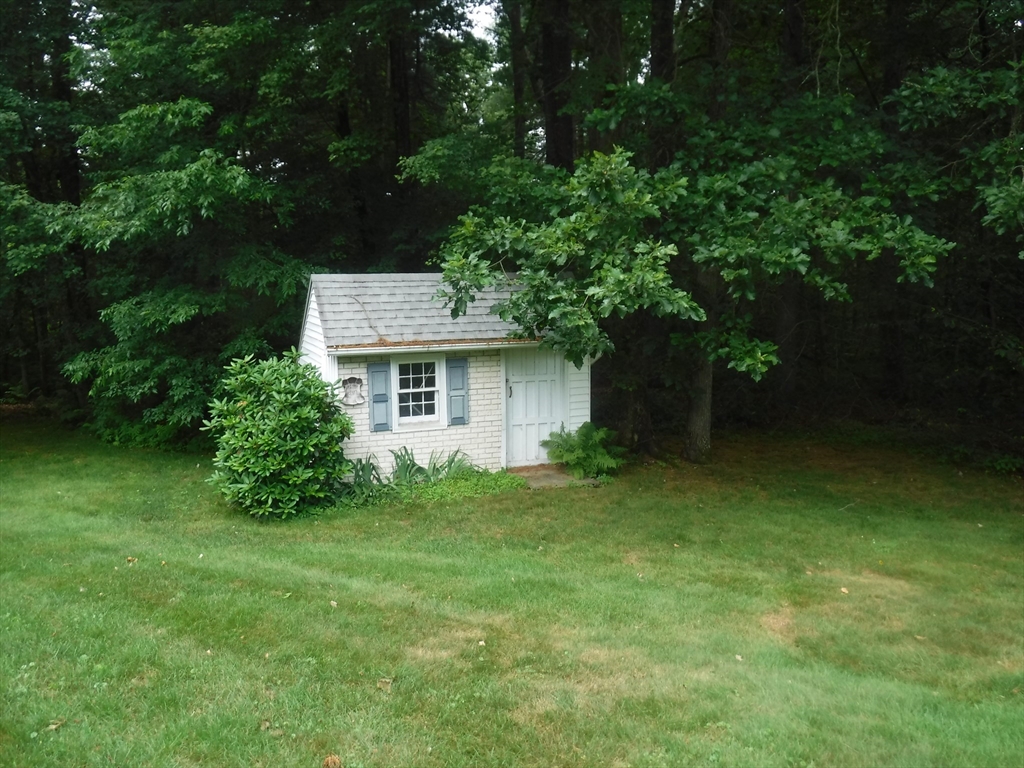 21 Old Orchard Road Hampden, MA 01036 - Photo 21 of 21 a view of a house with a backyard