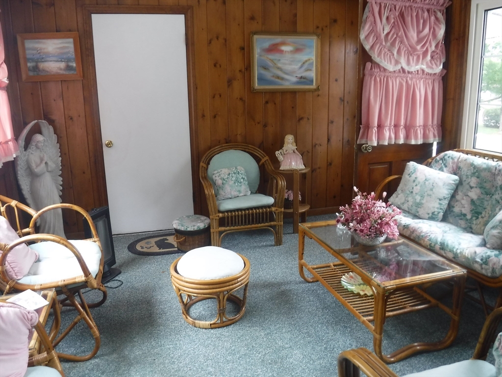 21 Old Orchard Road Hampden, MA 01036 - Photo 3 of 21 a living room with furniture a chandelier and a window