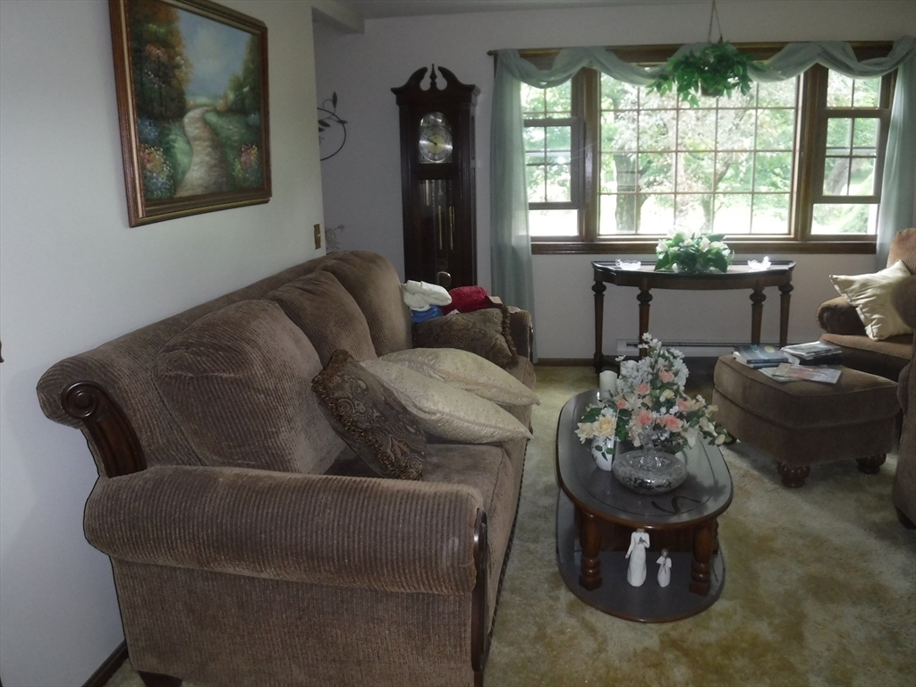 21 Old Orchard Road Hampden, MA 01036 - Photo 9 of 21 a living room with furniture and a large window