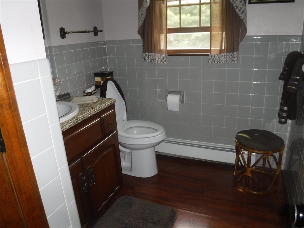 21 Old Orchard Road Hampden, MA 01036 - Photo 10 of 21 a bathroom with a sink and a toilet