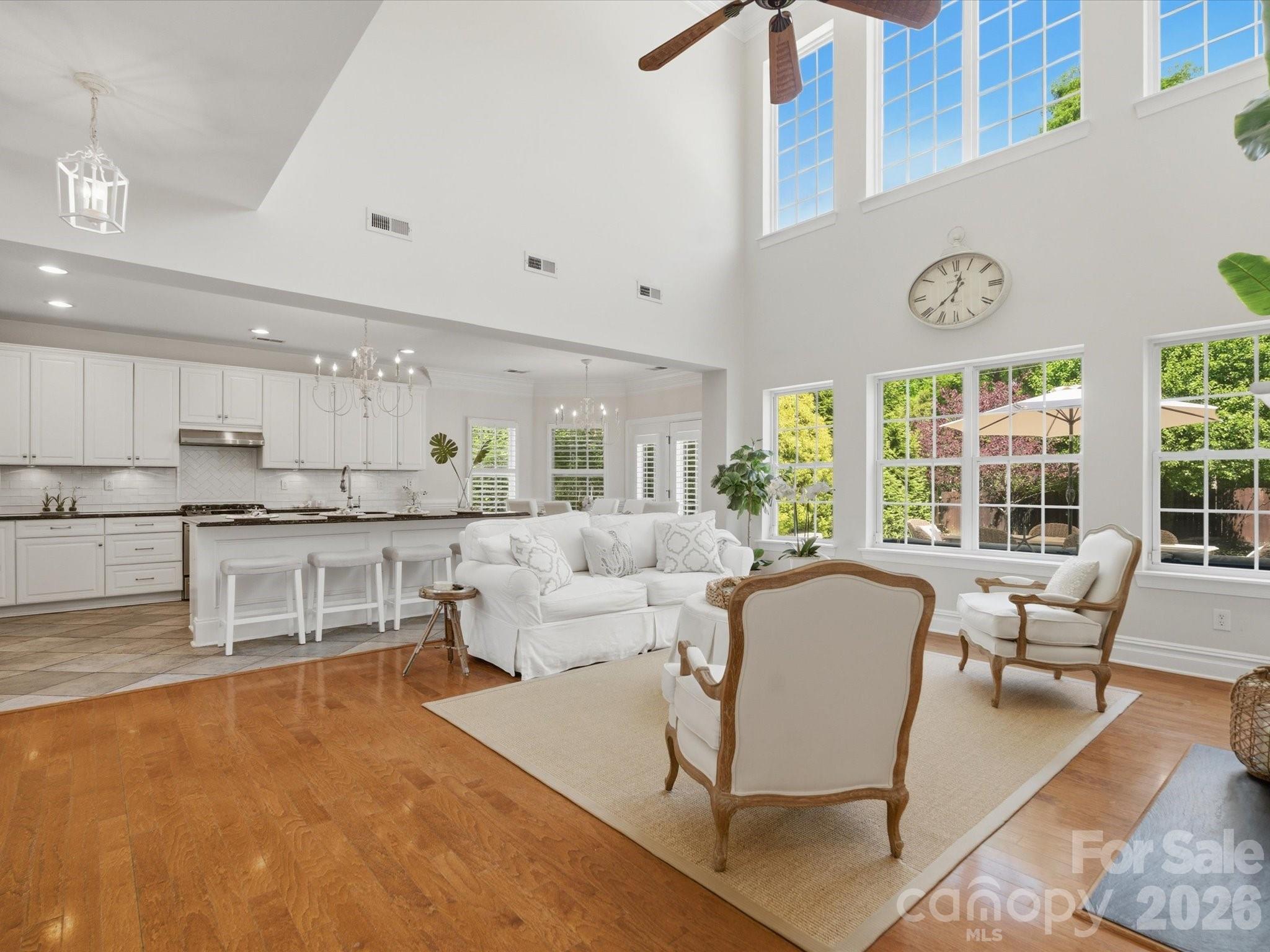 1026 Spanish Moss Road Indian Trail, NC 28079 - Photo 11 of 44 a living room with furniture and a large window