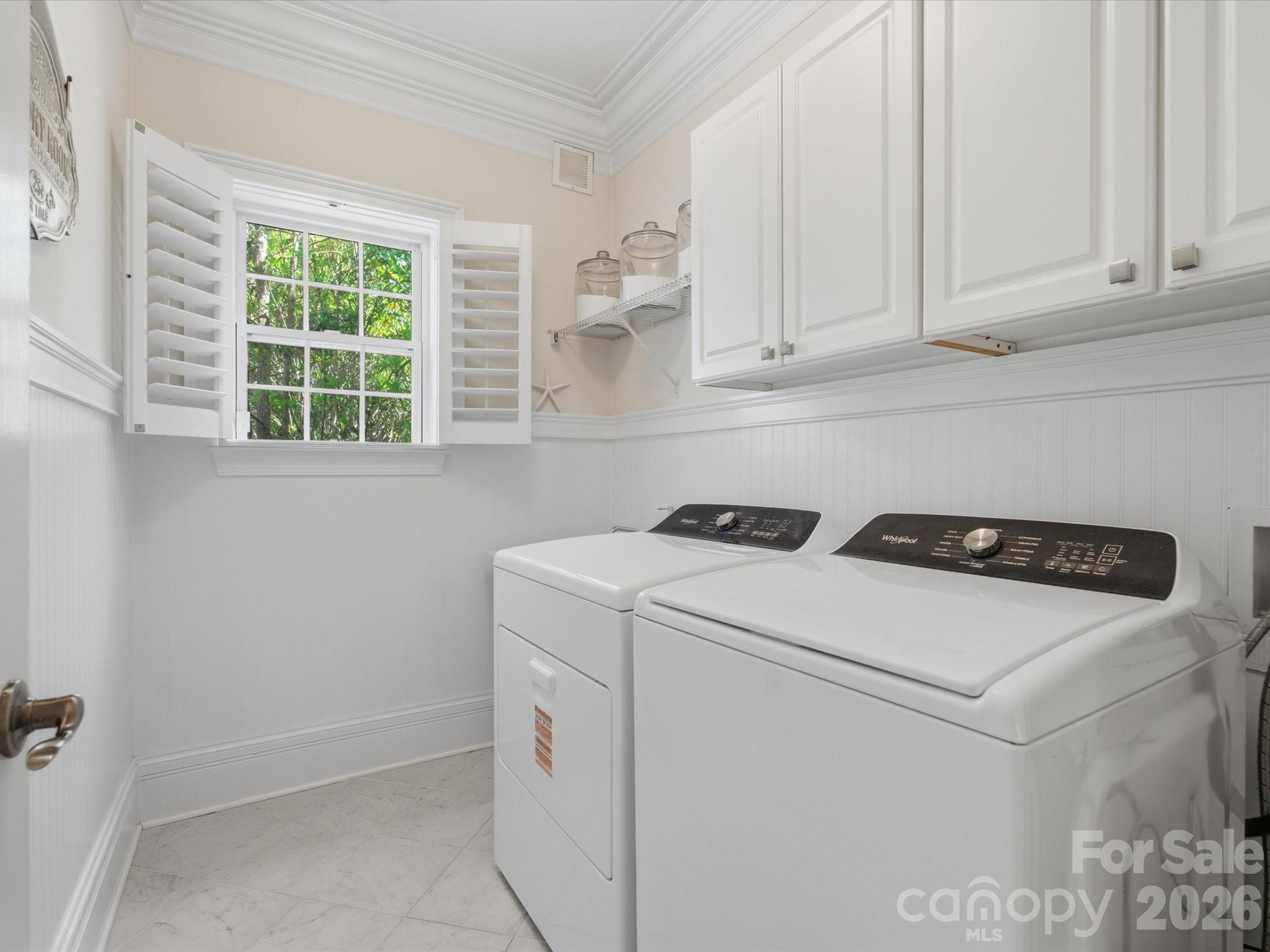 1026 Spanish Moss Road Indian Trail, NC 28079 - Photo 21 of 44 a utility room with dryer and washer