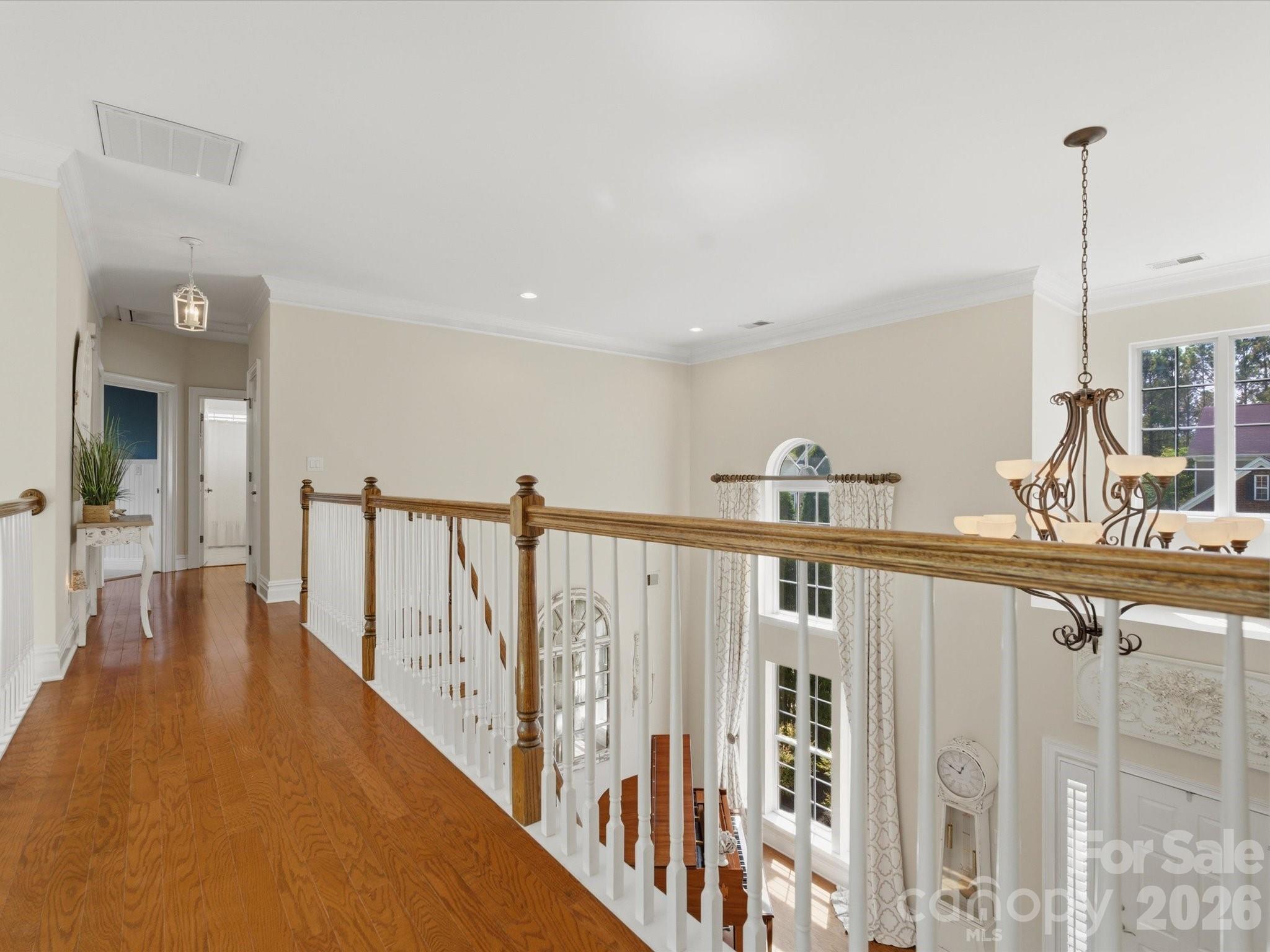 1026 Spanish Moss Road Indian Trail, NC 28079 - Photo 29 of 44 a view of a kitchen with furniture and staircase