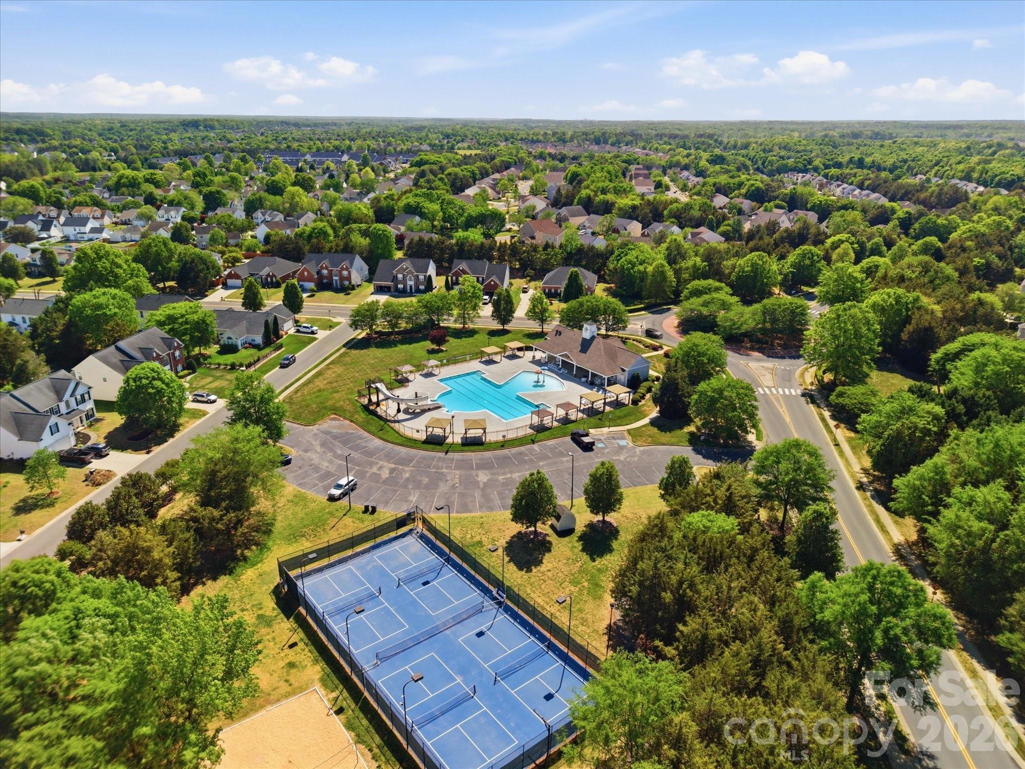 1026 Spanish Moss Road Indian Trail, NC 28079 - Photo 41 of 44 an aerial view of residential houses with outdoor space