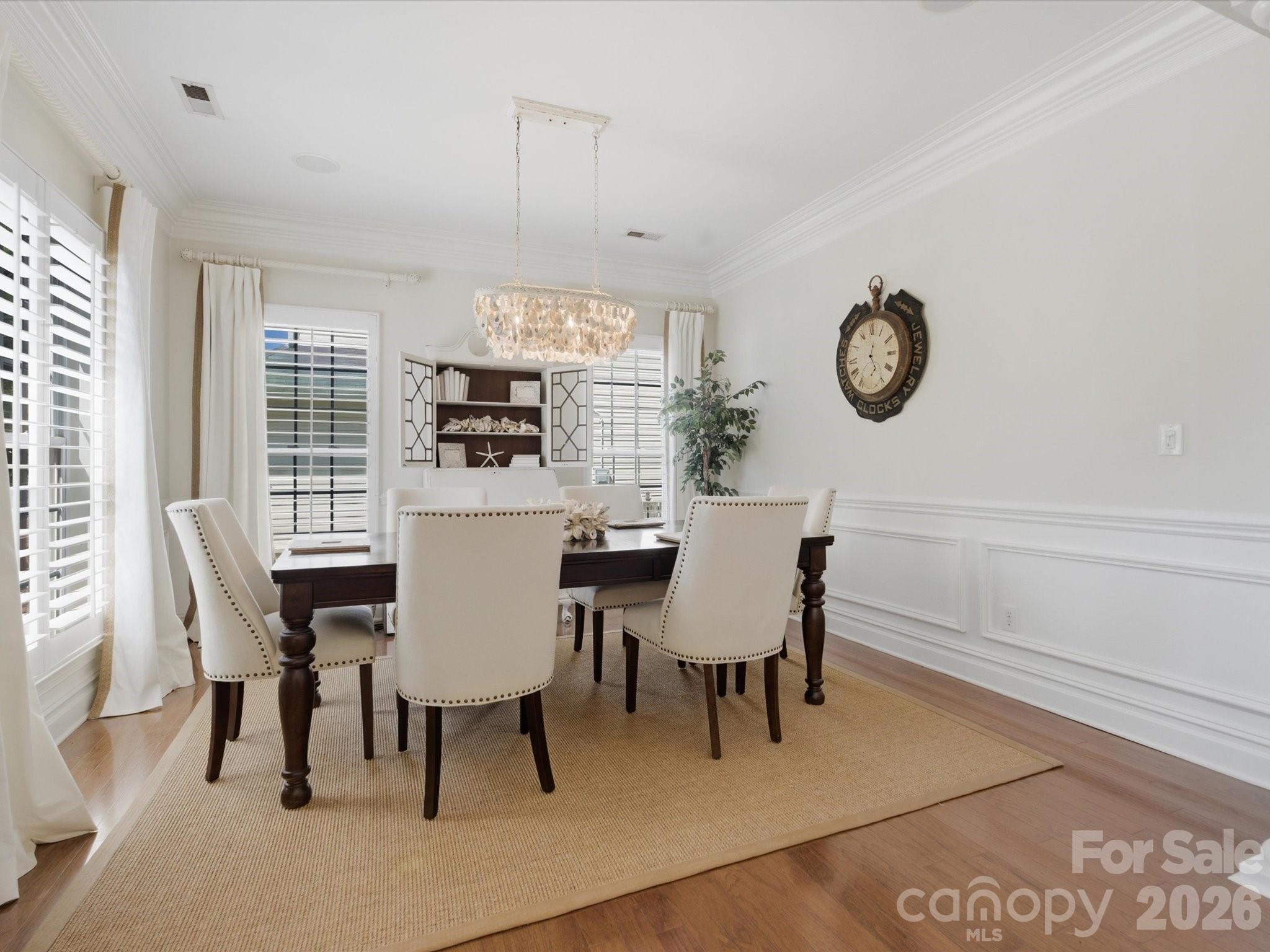 1026 Spanish Moss Road Indian Trail, NC 28079 - Photo 5 of 44 a view of a dining room with furniture and window