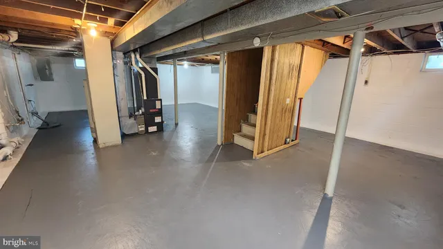 a view of a room with wooden walls