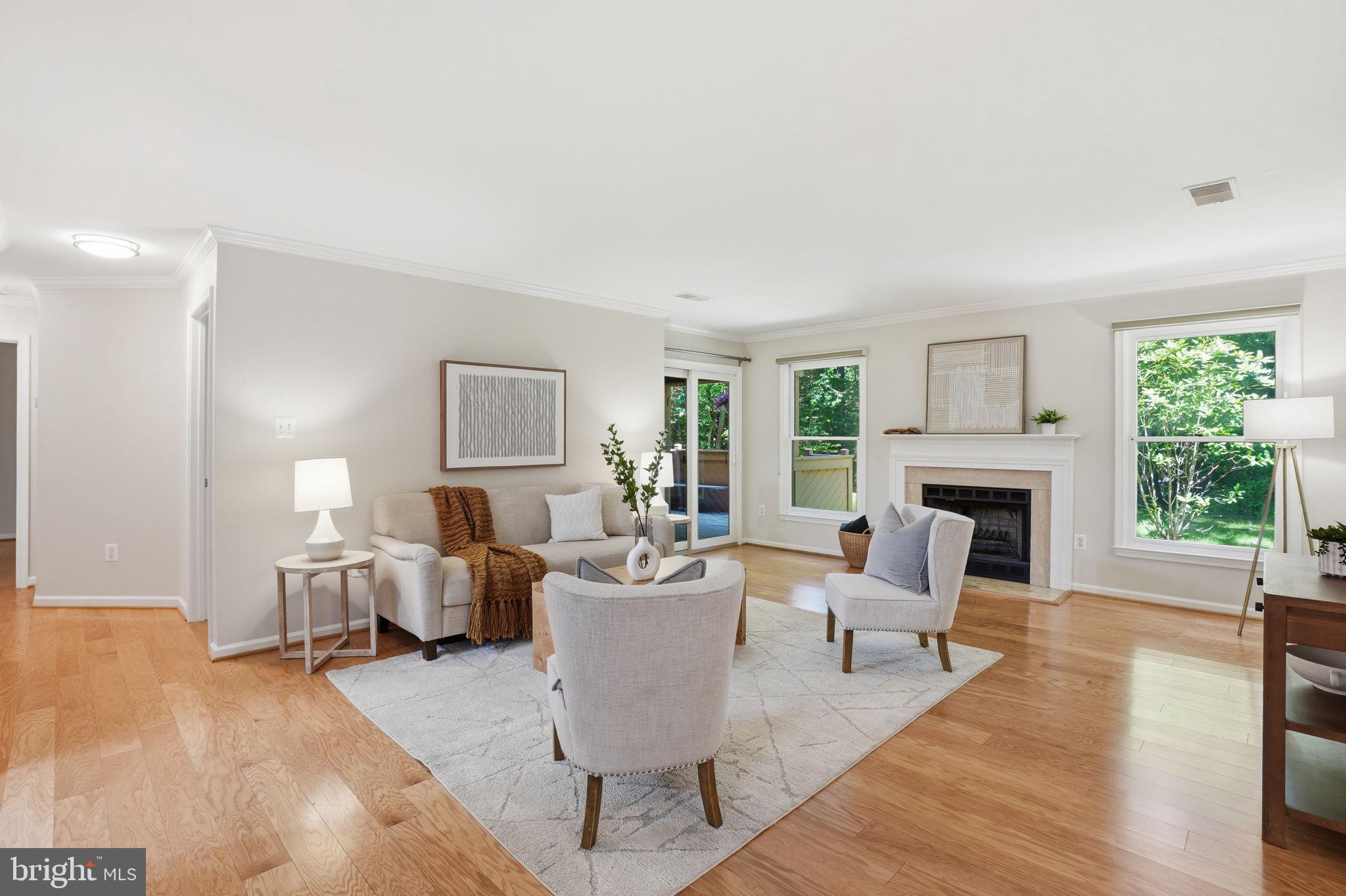 1495 Church Hill Place Reston, VA 20194 - Photo 6 of 27 a living room with fireplace furniture and a fireplace