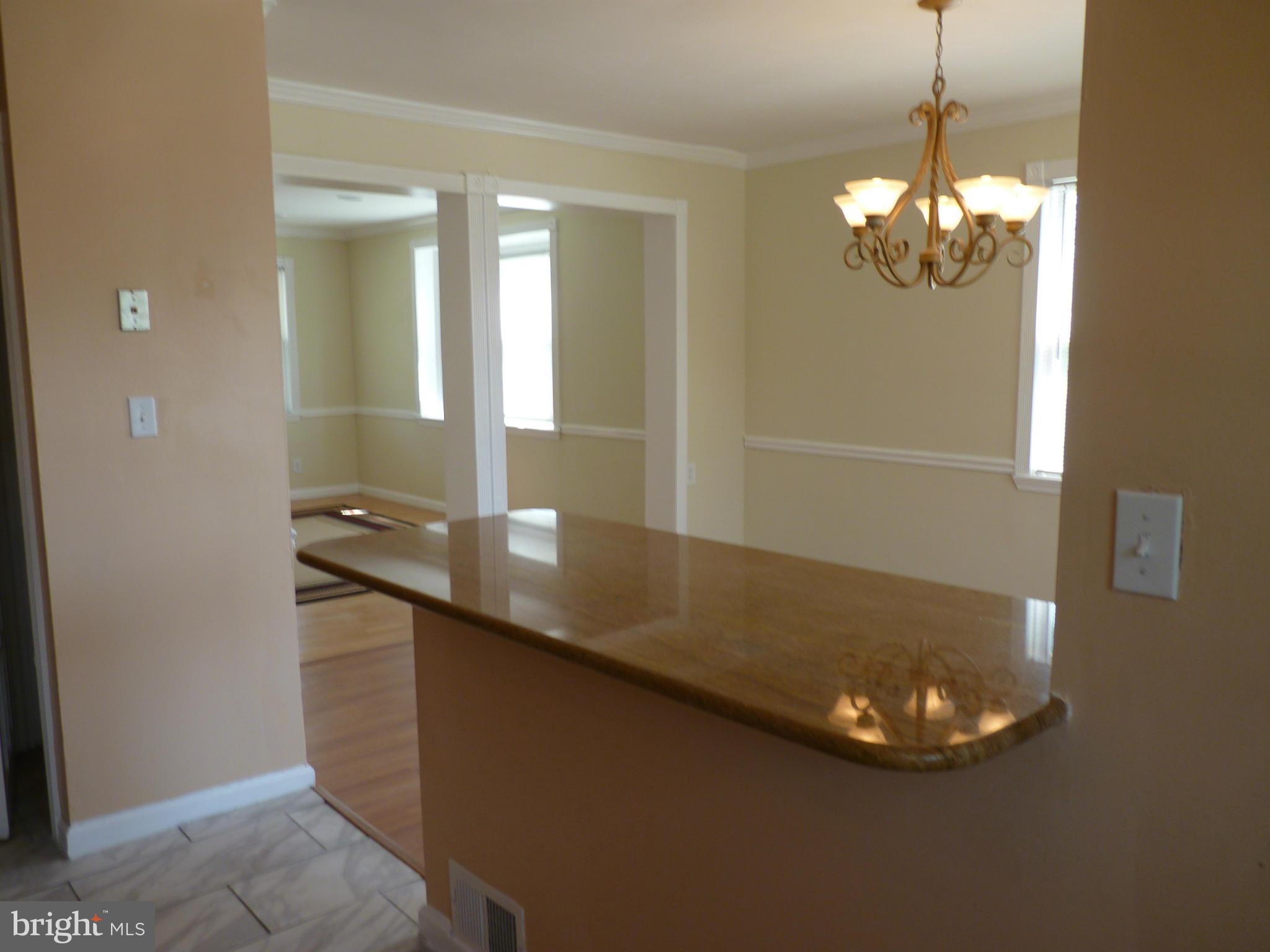 1551 Gleneagle Road Baltimore, MD 21239 - Photo 11 of 30 Kitchen Breakfast Bar