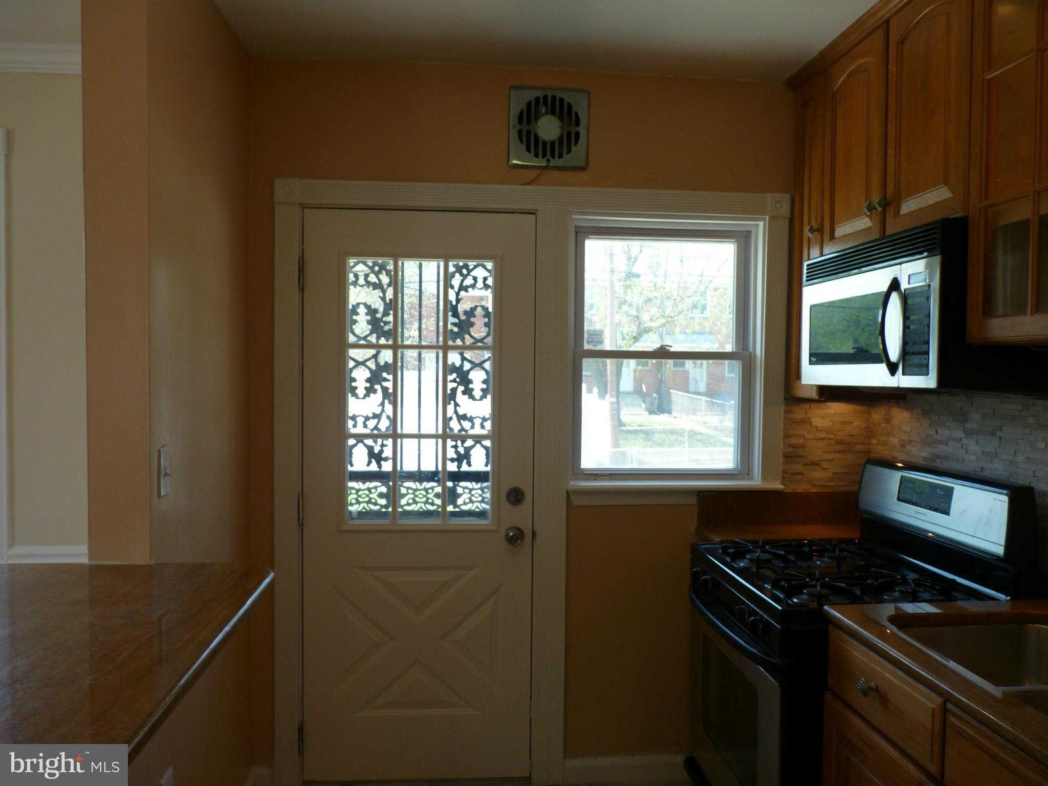 1551 Gleneagle Road Baltimore, MD 21239 - Photo 12 of 30 Kitchen Rear Door