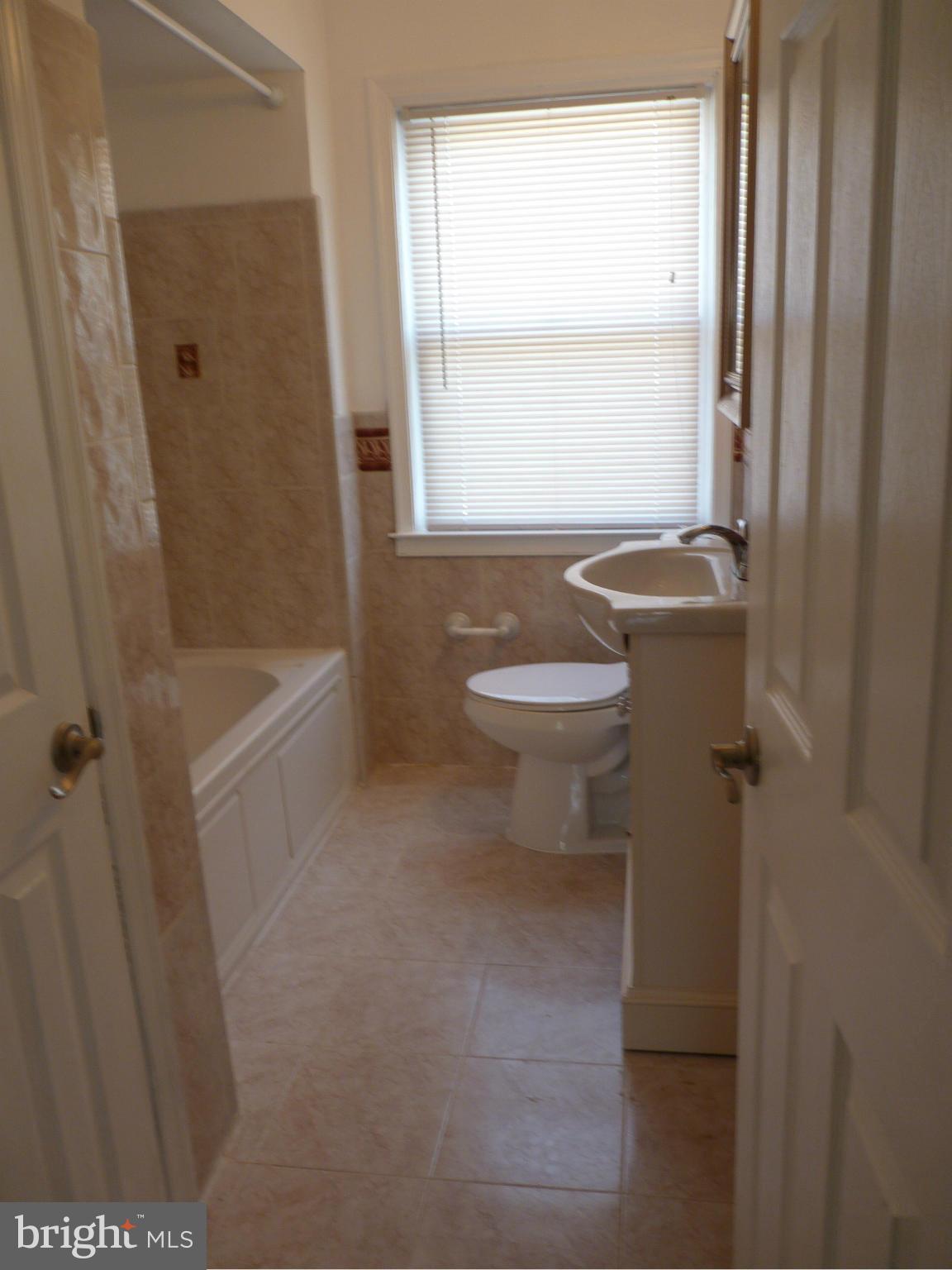 1551 Gleneagle Road Baltimore, MD 21239 - Photo 18 of 30 Upstairs Bath
