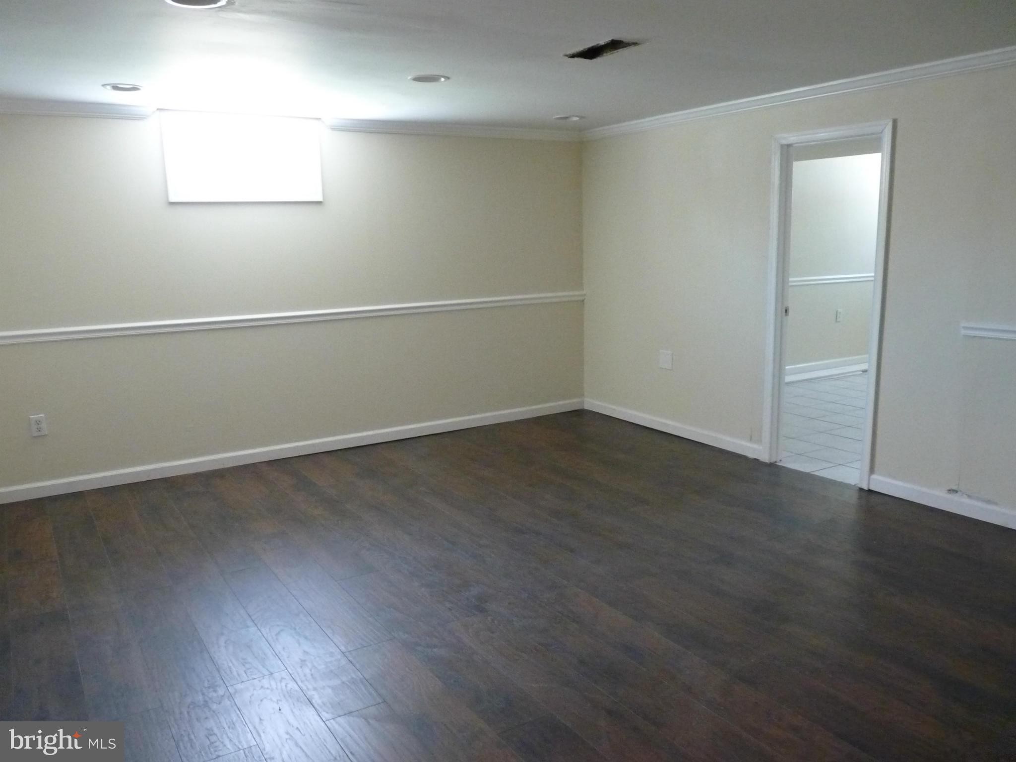1551 Gleneagle Road Baltimore, MD 21239 - Photo 22 of 30 Basement Rec Room