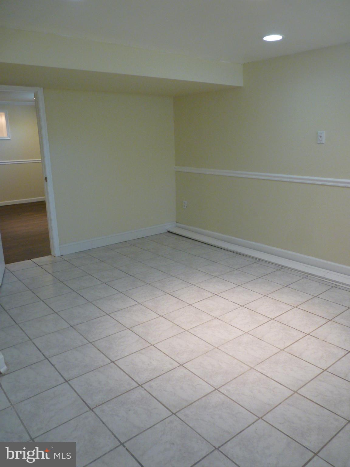 1551 Gleneagle Road Baltimore, MD 21239 - Photo 28 of 30 Basement Bonus Room
