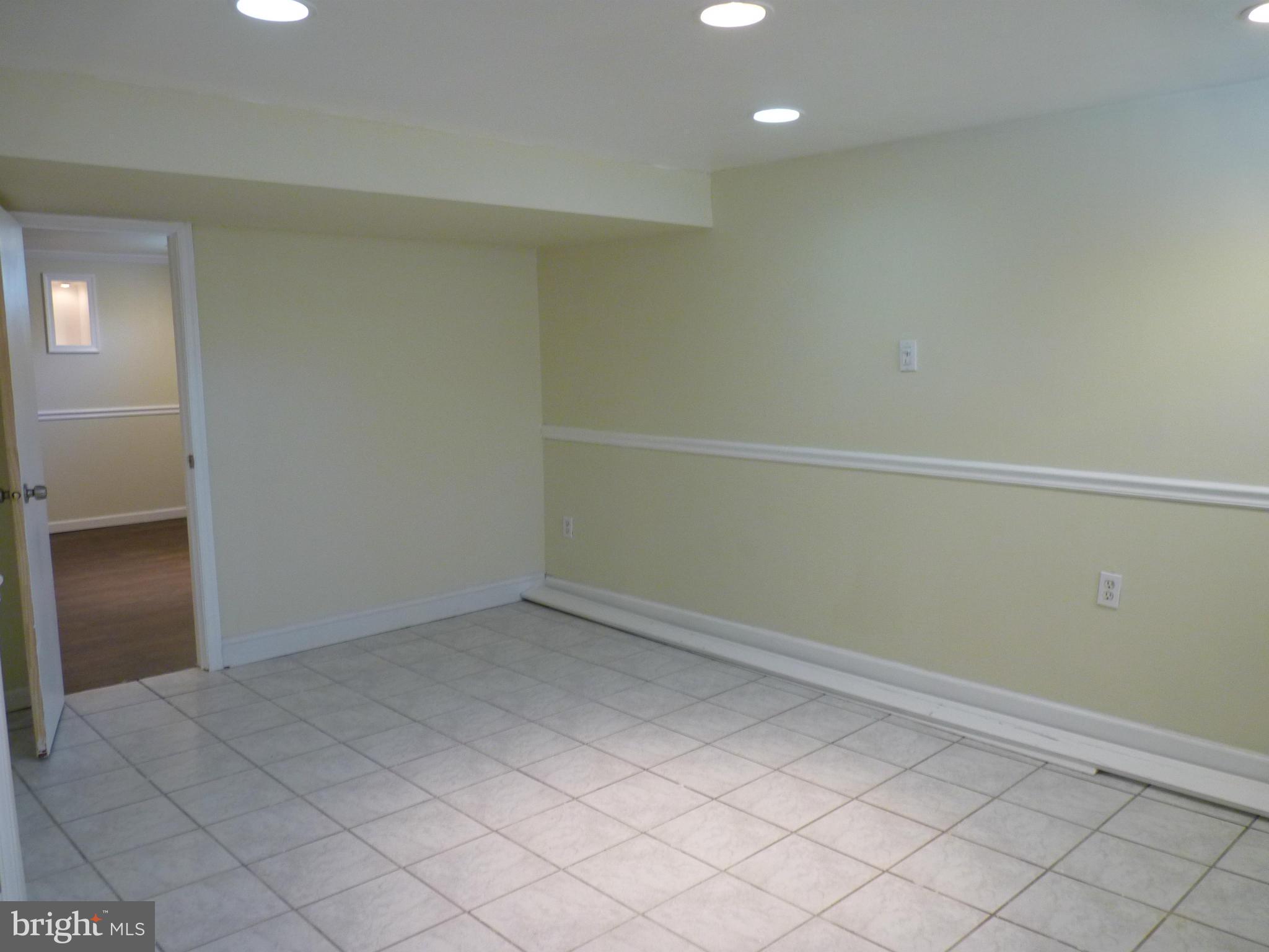 1551 Gleneagle Road Baltimore, MD 21239 - Photo 29 of 30 Basement Bonus Room