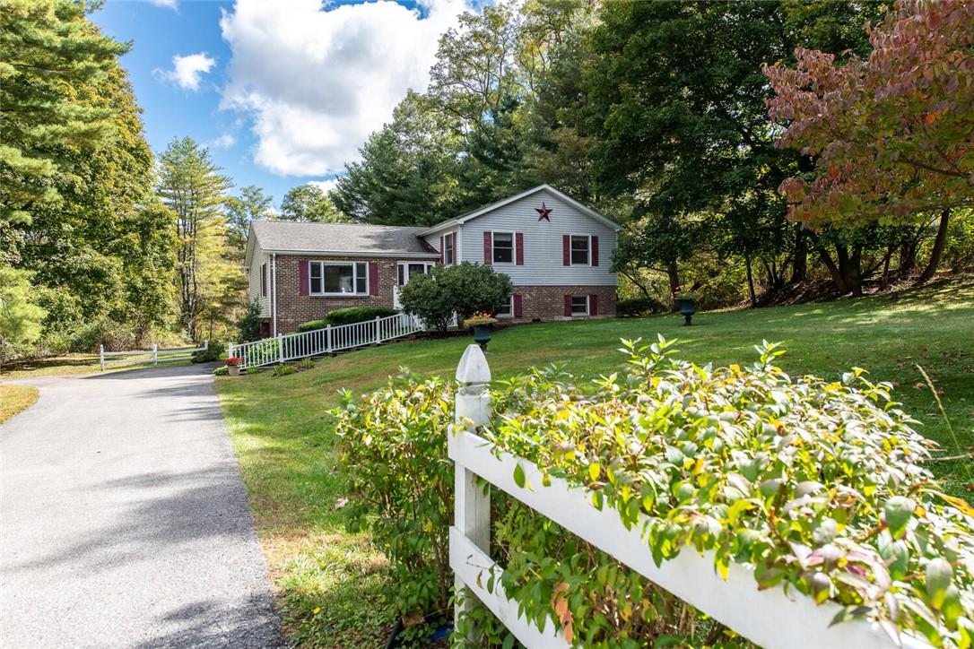 41 Horseshoe Road Millbrook, NY 12545 - Photo 1 of 1 a front view of a house with garden