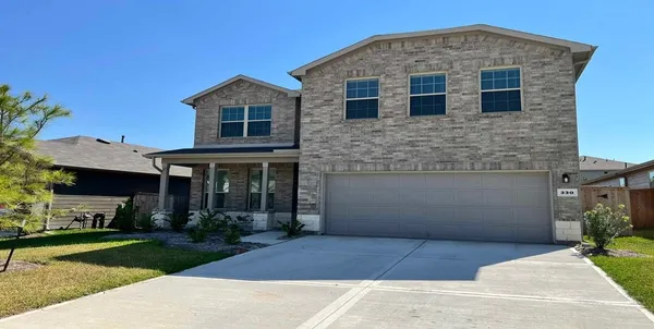 a front view of house with yard