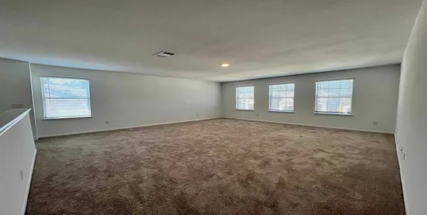 en empty room with windows