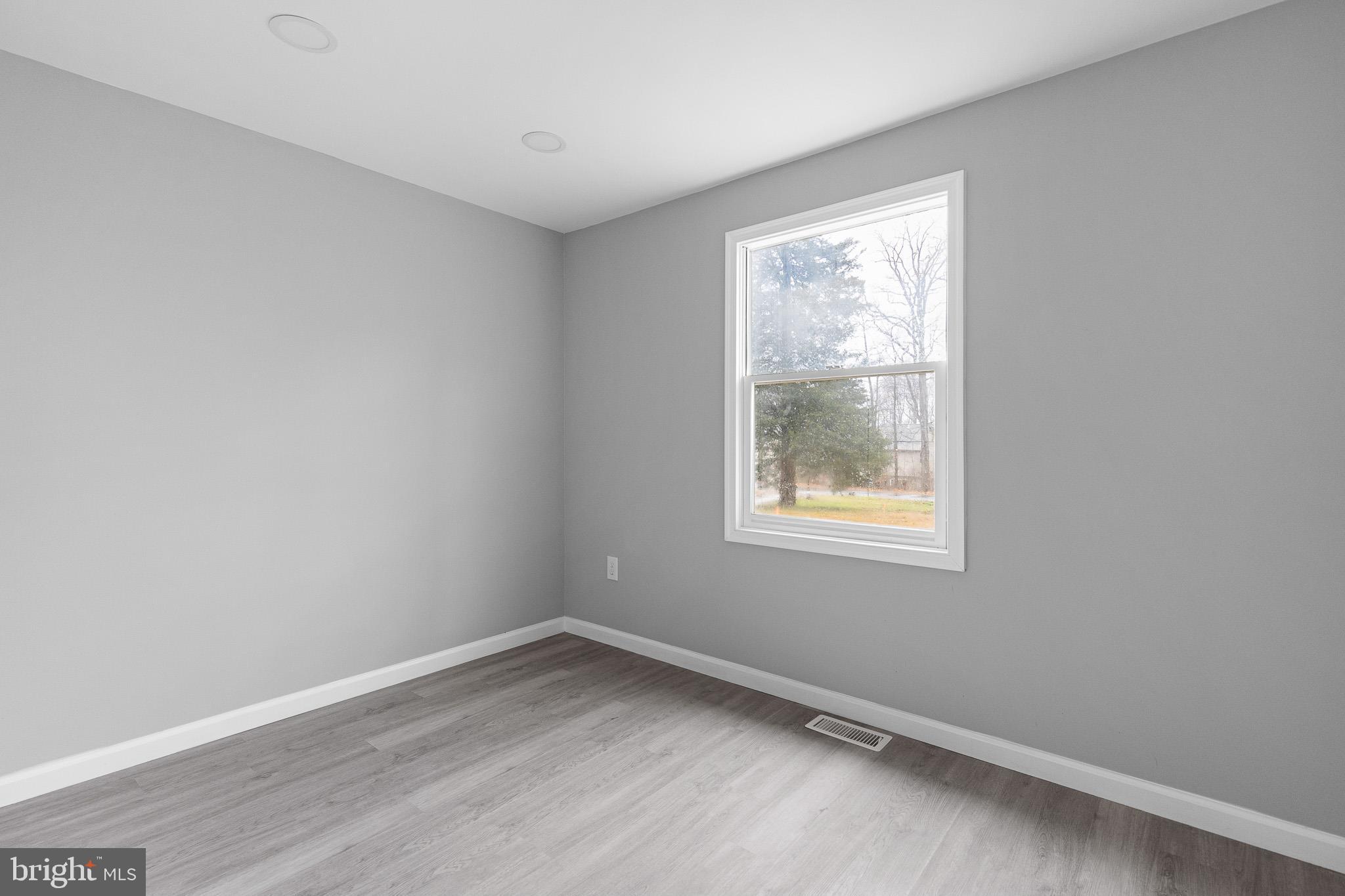 136 State Line Road Wilmington, DE 19803 - Photo 16 of 23 an empty room with a window