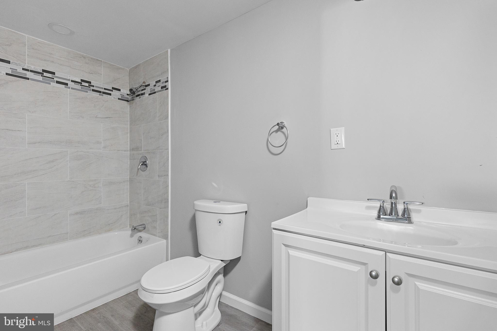 136 State Line Road Wilmington, DE 19803 - Photo 23 of 23 a bathroom with a sink toilet and shower