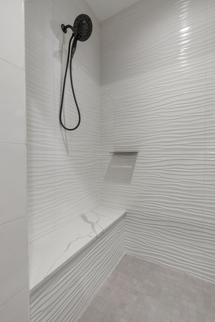 686 Jones Street Bettendorf, IA 52722 - Photo 18 of 21 a bathroom with a shower