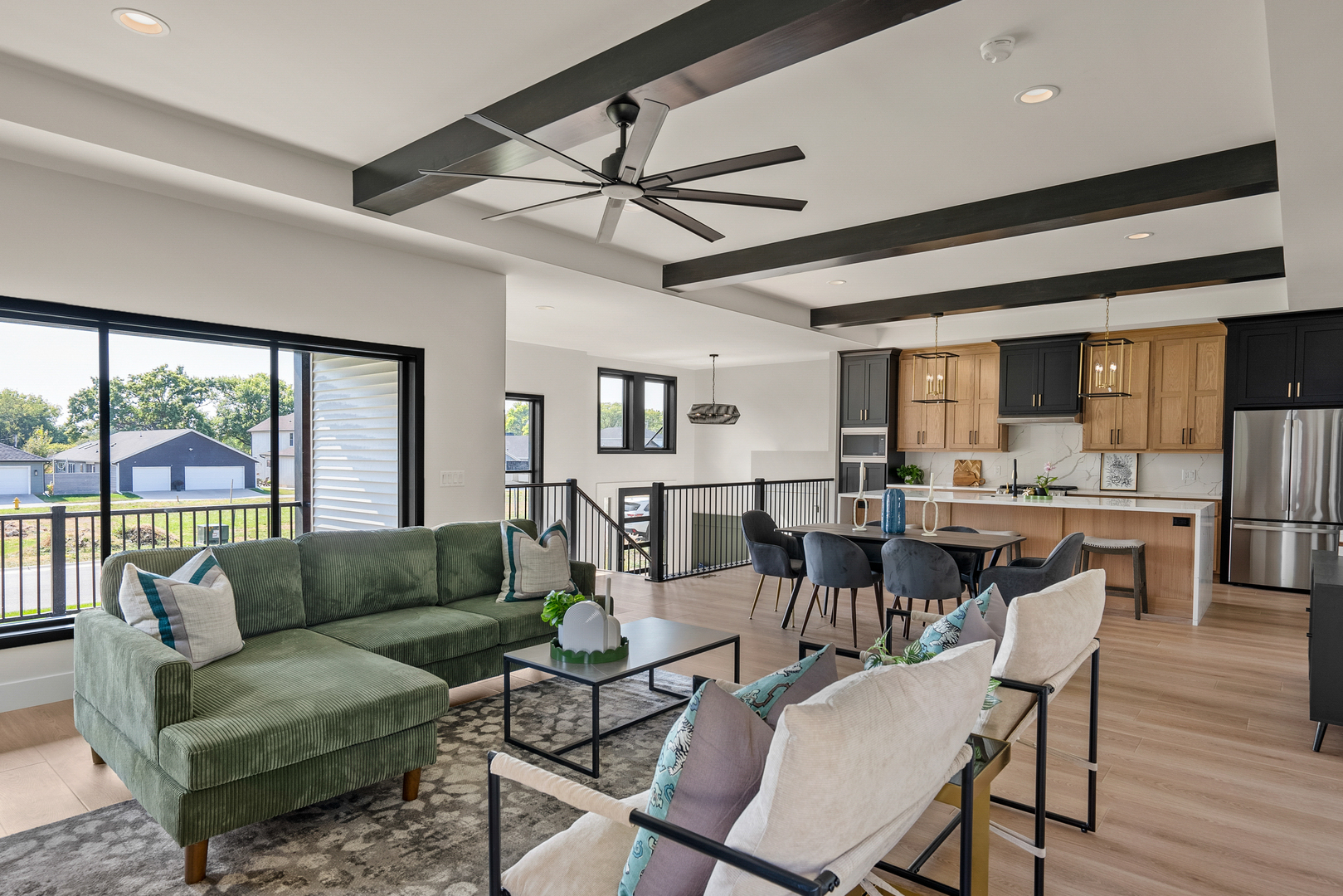 686 Jones Street Bettendorf, IA 52722 - Photo 5 of 21 a living room with furniture and a large window