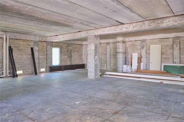 a view of a room with large windows