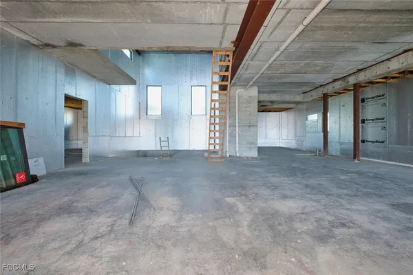 a view of empty room with windows